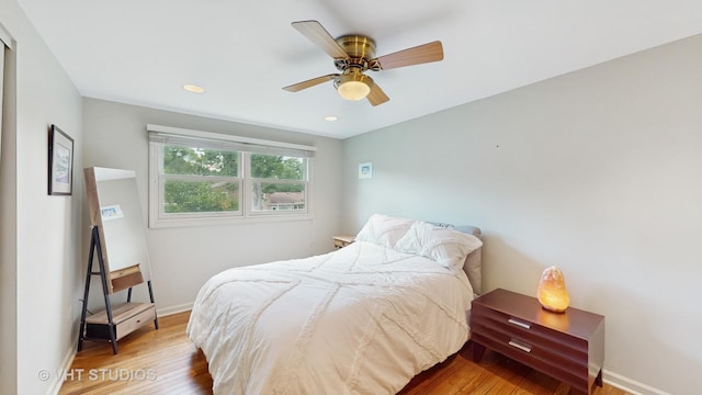 3026 N Stratford Rd, Arlington Heights, IL 60004 - bedroom with wood finished floors, ceiling fan, and recessed lighting