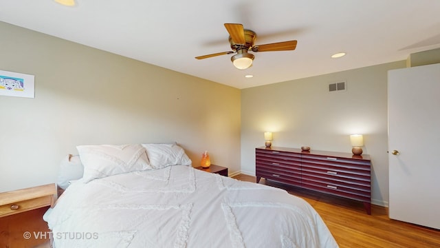 3026 N Stratford Rd, Arlington Heights, IL 60004 - bedroom featuring wood finished floors, a ceiling fan, and recessed lighting
