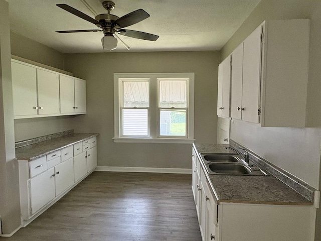 153 N Entrance Ave, Kankakee, IL 60901 - kitchen with wood finished floors and white cabinets