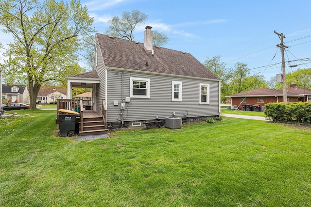 3618 178th St, Lansing, IL 60438 - rear view of property featuring a chimney, a yard, cooling unit, a wooden deck, and a shingled roof