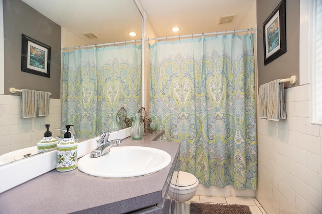 1663 W Farwell Ave, Chicago, IL 60626 - bathroom with tile walls, tile patterned flooring, vanity, toilet, and a shower with shower curtain
