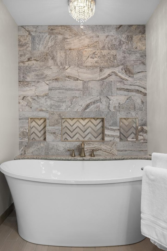 4416 Seeley Ave, Downers Grove, IL 60515 - bathroom with a freestanding bath and a chandelier