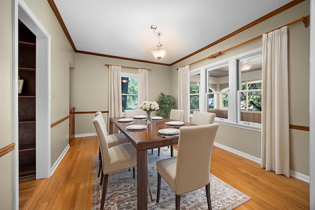 4416 Seeley Ave, Downers Grove, IL 60515 - dining area with ornamental molding and light wood-type flooring