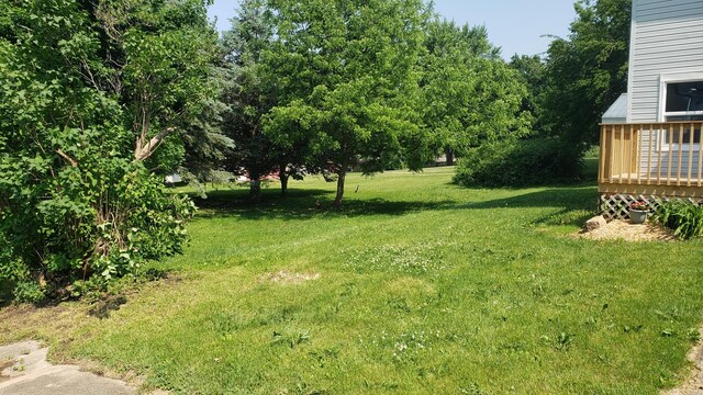 402 W Fulton St, Polo, IL 61064 - view of grassy yard with a wooden deck