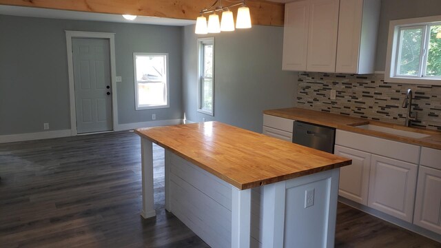 402 W Fulton St, Polo, IL 61064 - kitchen featuring wooden counters, a sink, and stainless steel dishwasher