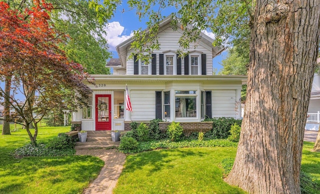 320 E Locust St, Watseka, IL 60970 - view of front of house with a front lawn