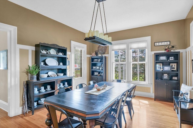 320 E Locust St, Watseka, IL 60970 - dining area with light wood finished floors and baseboards
