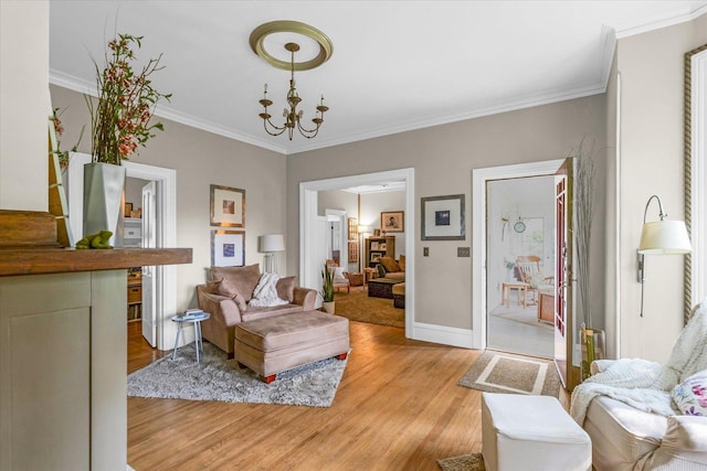 320 E Locust St, Watseka, IL 60970 - living area featuring light wood-style floors, a chandelier, and crown molding