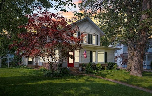320 E Locust St, Watseka, IL 60970 - view of front of property featuring a front yard