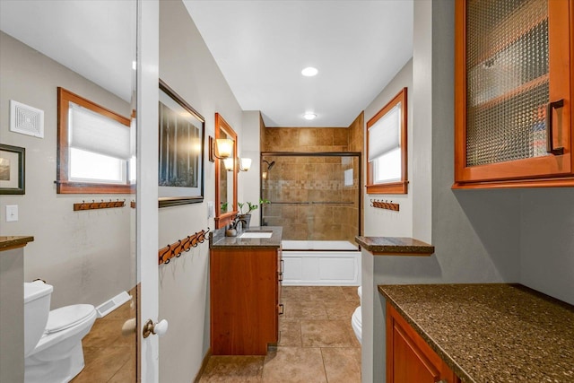320 E Locust St, Watseka, IL 60970 - bathroom featuring vanity, healthy amount of natural light, and tile patterned floors