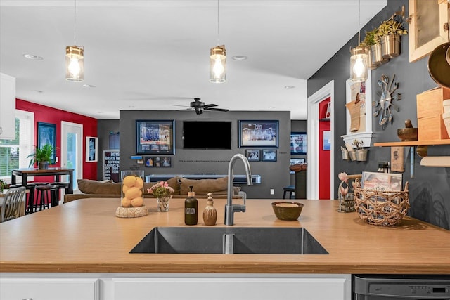 320 E Locust St, Watseka, IL 60970 - kitchen featuring open floor plan, recessed lighting, stainless steel dishwasher, ceiling fan, and white cabinetry