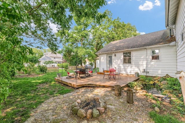 320 E Locust St, Watseka, IL 60970 - view of yard with a fire pit, a wooden deck, and outdoor dining space