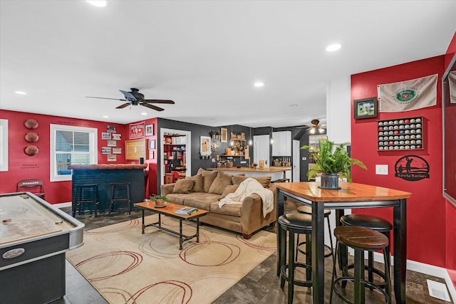 320 E Locust St, Watseka, IL 60970 - living room with a ceiling fan, a bar, and recessed lighting