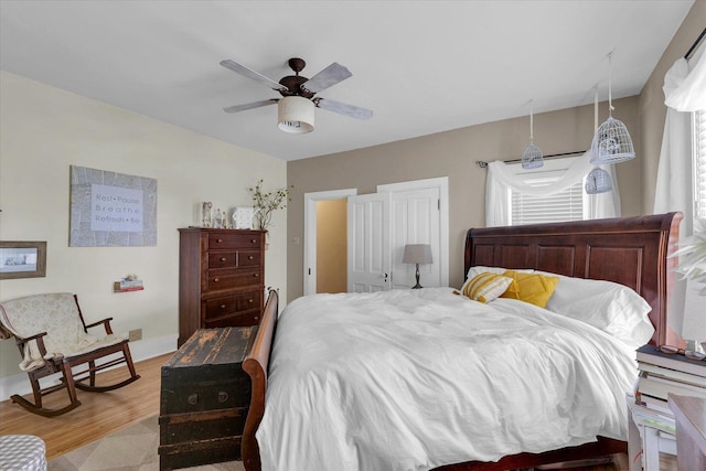 320 E Locust St, Watseka, IL 60970 - bedroom with light wood-style floors and a ceiling fan