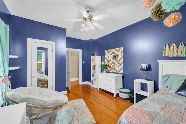 320 E Locust St, Watseka, IL 60970 - bedroom with wood finished floors and ceiling fan