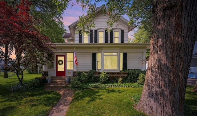 320 E Locust St, Watseka, IL 60970 - view of front of property featuring a front lawn