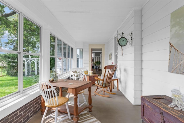 320 E Locust St, Watseka, IL 60970 - sunroom / solarium with healthy amount of natural light and concrete floors