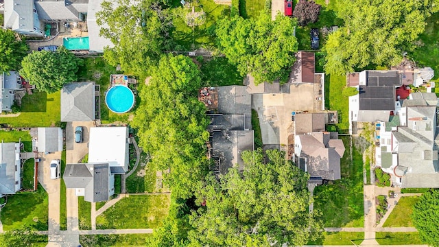 320 E Locust St, Watseka, IL 60970 - aerial perspective of suburban area with a pool area