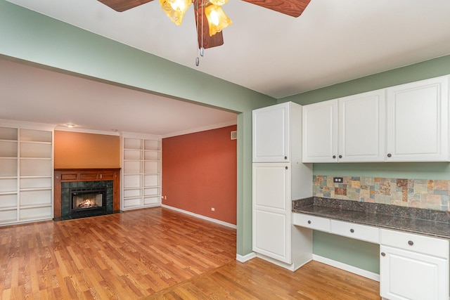 2015 Steward Ln, Plainfield, IL 60586 - kitchen featuring a ceiling fan, white cabinets, and light wood-style flooring