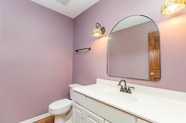 2015 Steward Ln, Plainfield, IL 60586 - half bath with toilet, vanity, wood finished floors, and baseboards