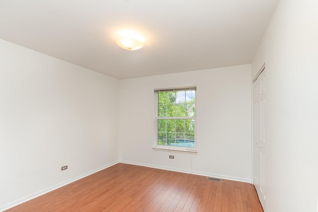 2015 Steward Ln, Plainfield, IL 60586 - spare room featuring light wood-type flooring and baseboards