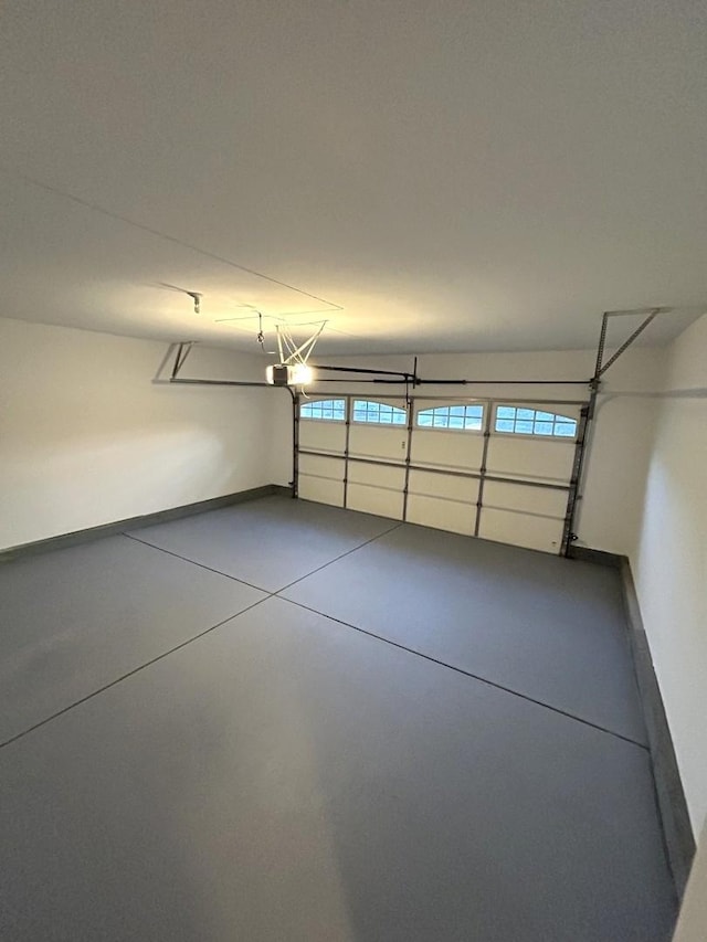 2015 Steward Ln, Plainfield, IL 60586 - garage featuring baseboards