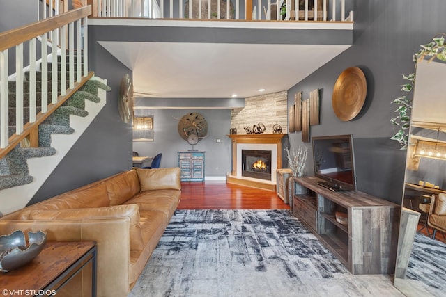 1959 Lancaster Ct Unit 4, Naperville, IL 60565 - living room with wood finished floors, stairs, and a fireplace