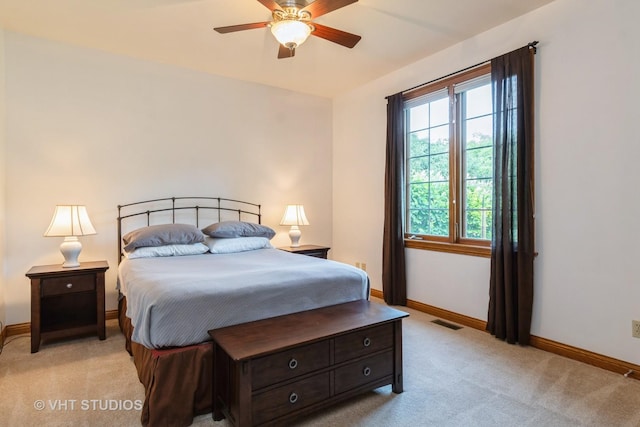 8820 Wilcox Ct, Newark, IL 60541 - bedroom with light colored carpet and ceiling fan