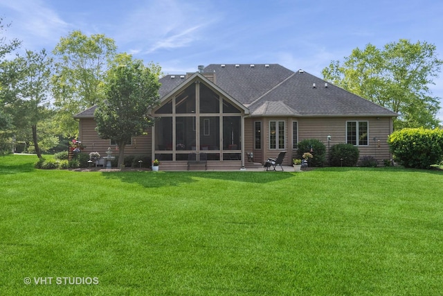 8820 Wilcox Ct, Newark, IL 60541 - back of property featuring a lawn, a sunroom, a patio, and roof with shingles