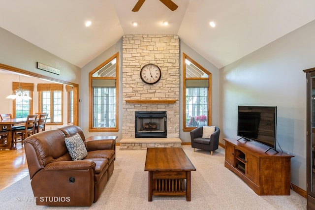 8820 Wilcox Ct, Newark, IL 60541 - living room featuring ceiling fan, plenty of natural light, a fireplace, high vaulted ceiling, and recessed lighting