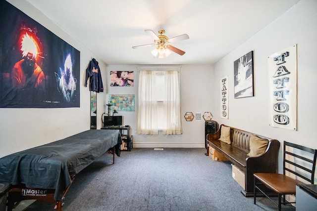 1340 E 76th St, Chicago, IL 60619 - living area with carpet floors, ceiling fan, and baseboards