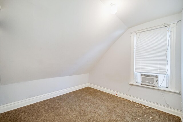 1340 E 76th St, Chicago, IL 60619 - bonus room featuring lofted ceiling, carpet floors, baseboards, and cooling unit