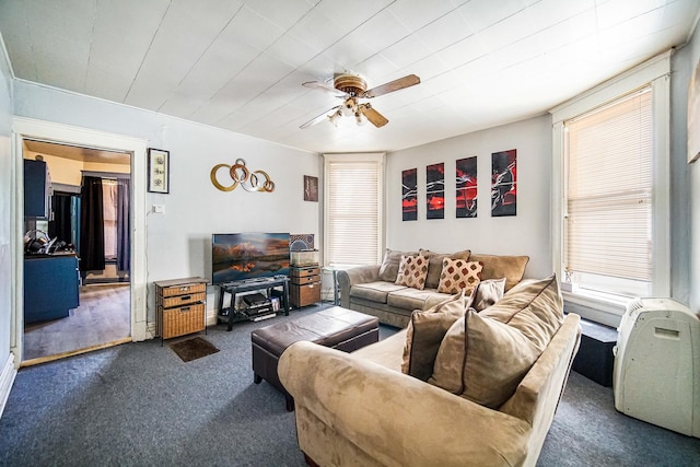 1340 E 76th St, Chicago, IL 60619 - carpeted living area with ceiling fan and healthy amount of natural light