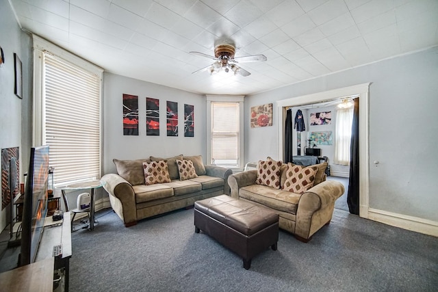 1340 E 76th St, Chicago, IL 60619 - living area with a ceiling fan and carpet