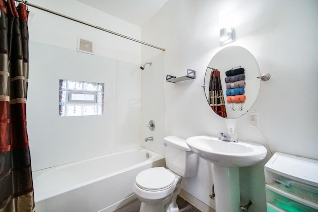 1340 E 76th St, Chicago, IL 60619 - bathroom featuring toilet and shower / bath combo
