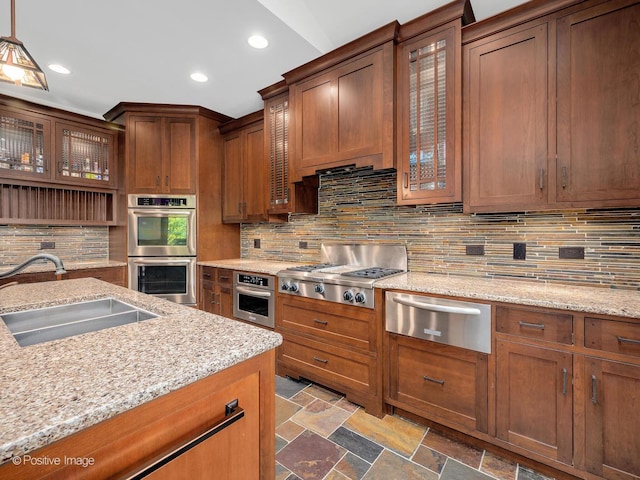 456 S Julian St, Naperville, IL 60540 - kitchen featuring a warming drawer, stainless steel appliances, decorative backsplash, recessed lighting, and stone finish flooring