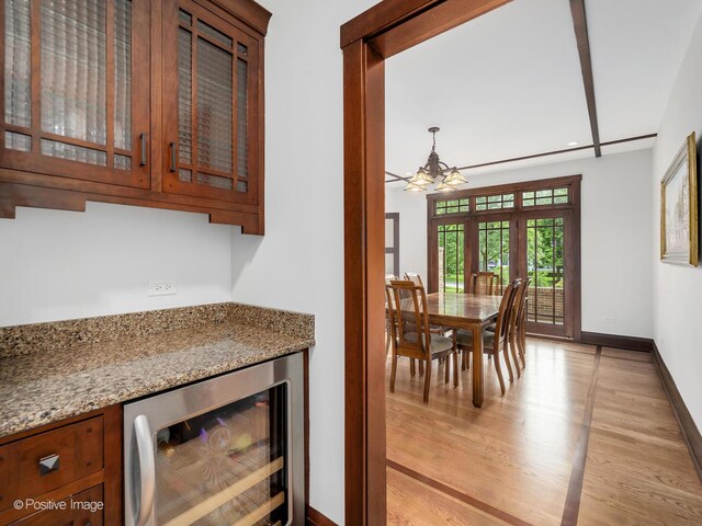 456 S Julian St, Naperville, IL 60540 - indoor dry bar featuring wine cooler, a chandelier, and light wood-style flooring