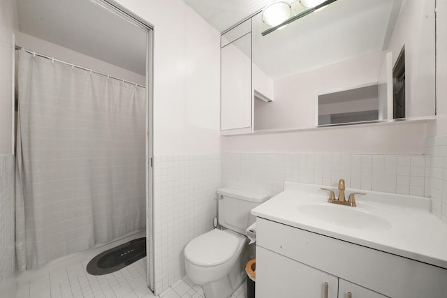 40 E 9th St Unit 1807, Chicago, IL 60605 - full bath featuring vanity, toilet, a wainscoted wall, tile patterned flooring, and tile walls
