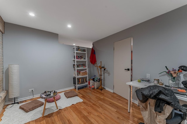 40 E 9th St Unit 1807, Chicago, IL 60605 - exercise area with light wood finished floors, recessed lighting, and baseboards