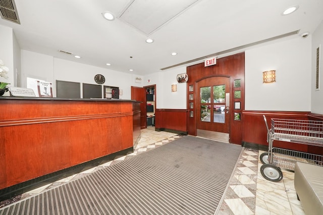 40 E 9th St Unit 1807, Chicago, IL 60605 - reception area featuring a wainscoted wall, recessed lighting, and a surveillance system