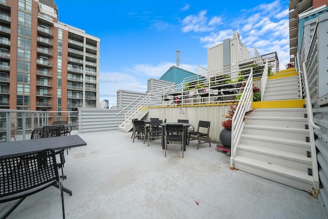 40 E 9th St Unit 1807, Chicago, IL 60605 - view of patio / terrace with outdoor dining space and stairway