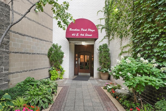 40 E 9th St Unit 1807, Chicago, IL 60605 - doorway to property with brick siding