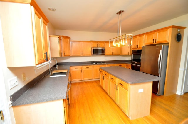 606 Reserve Ln, Joliet, IL 60431 - kitchen with appliances with stainless steel finishes, a sink, a center island, light brown cabinets, and recessed lighting