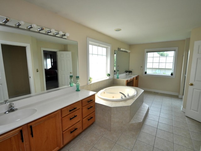 606 Reserve Ln, Joliet, IL 60431 - full bath featuring a garden tub, vanity, and tile patterned floors