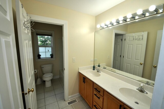606 Reserve Ln, Joliet, IL 60431 - bathroom featuring tile patterned flooring, double vanity, and shower / bath combination