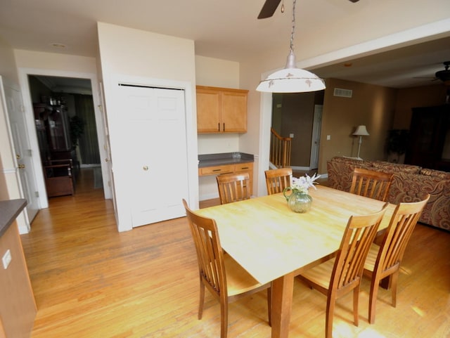 606 Reserve Ln, Joliet, IL 60431 - dining area featuring ceiling fan and light wood-style floors