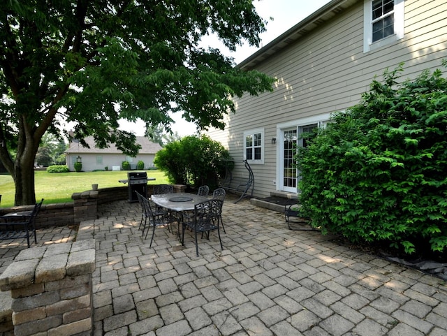 606 Reserve Ln, Joliet, IL 60431 - view of patio featuring outdoor dining area and area for grilling