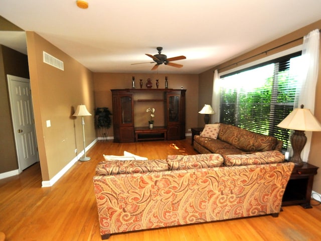 606 Reserve Ln, Joliet, IL 60431 - living room with a ceiling fan and wood finished floors
