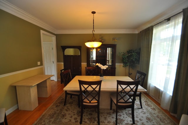 606 Reserve Ln, Joliet, IL 60431 - dining room with wood finished floors and crown molding