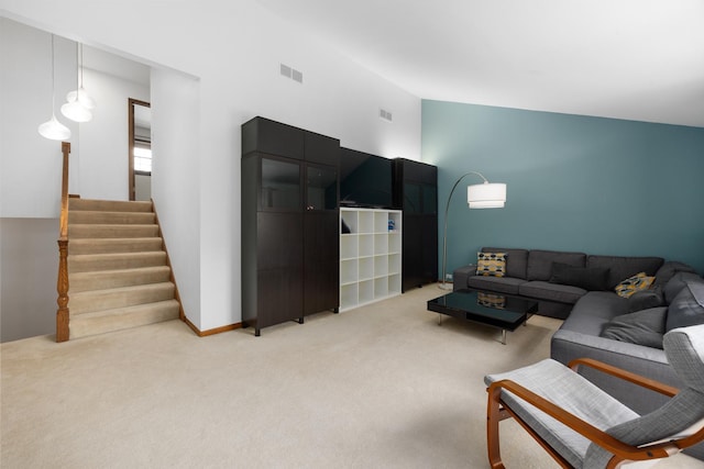 1125 Huntleigh Dr, Naperville, IL 60540 - living room with light carpet, lofted ceiling, and stairway